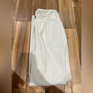 Cream colored trousers